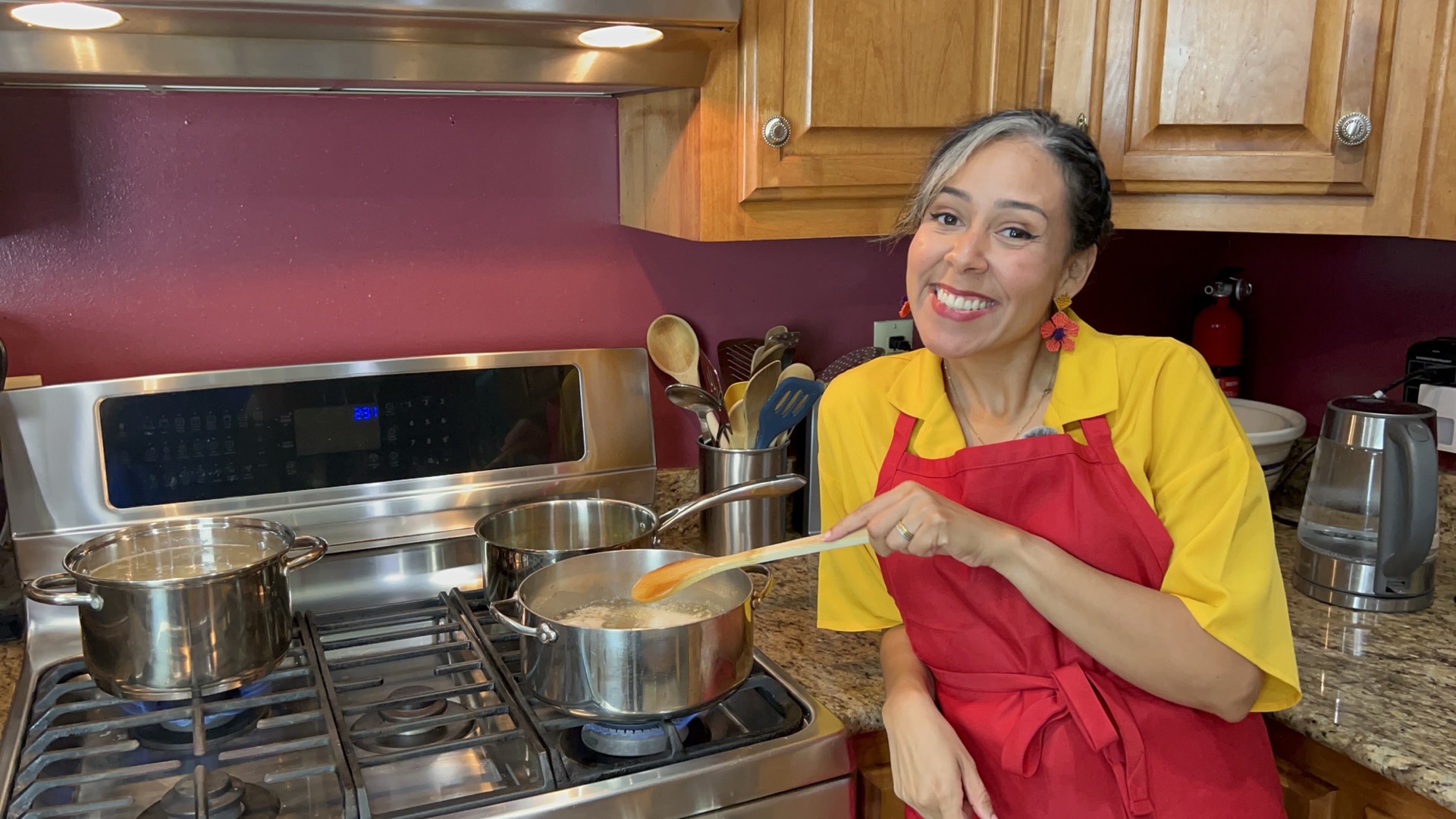 Mishelle Miller cooking in her kitchen.